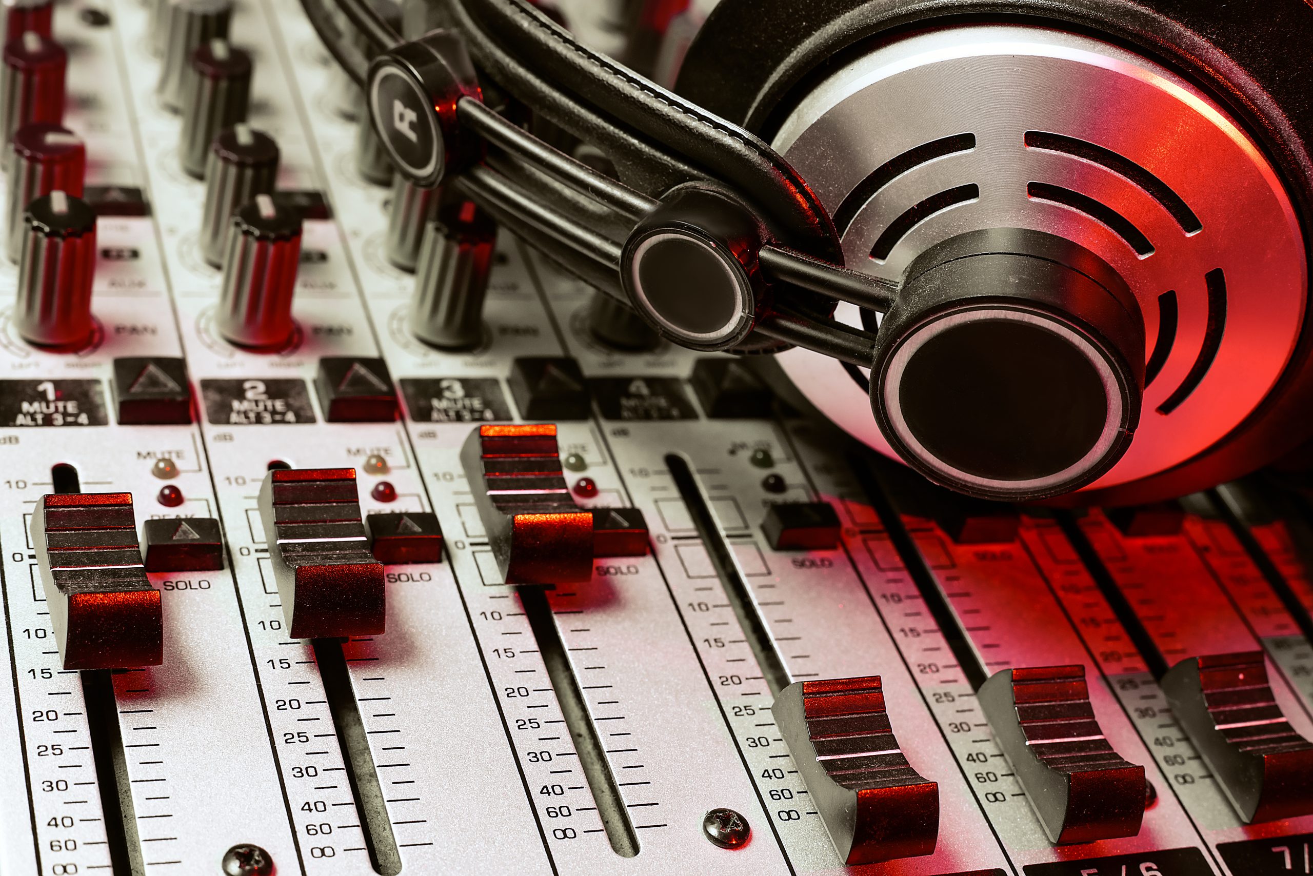 sound mixer and headphones. club party DJ sound engeneering